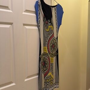 Etro midi dress in size 42. Cap sleeves with black and yellow design.Fully lined